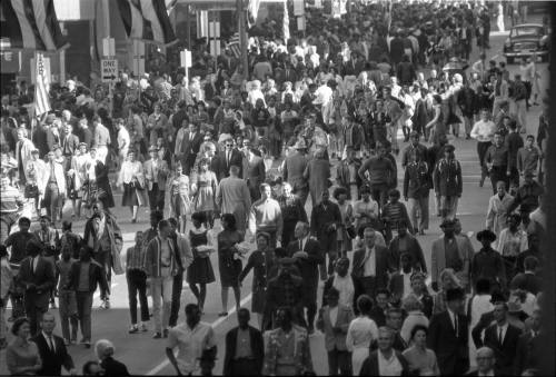 Image of the crowd on Main Street after the presidential motorcade passed by