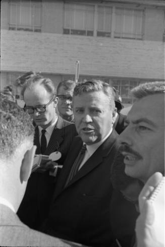 Image of Senator Ralph Yarborough addressing the press at Parkland Hospital