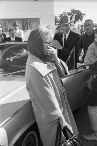 Image of an unidentified woman outside of Parkland Hospital
