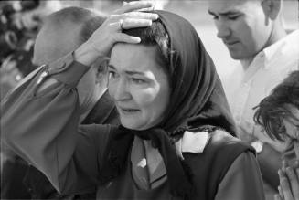 Image of a woman outside Parkland Hospital the day of the assassination