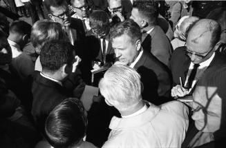 Image of Senator Ralph Yarborough talking with press outside Parkland Hospital