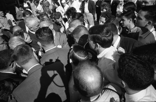 Image of members of the press interviewing people outside of Parkland Hospital