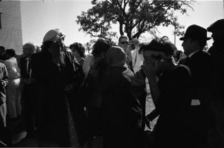 Image of people outside Parkland reacting to news of President Kennedy's death