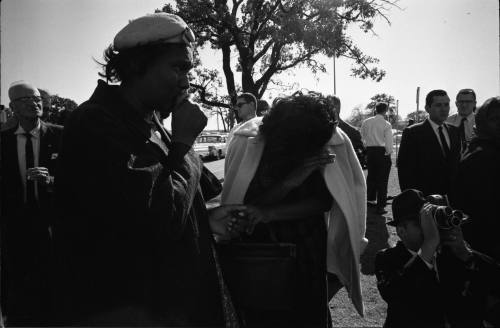 Image of people outside Parkland reacting to news of President Kennedy's death