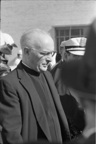 Image of Rev. James N. Thompson leaving Parkland Hospital