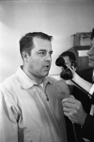 Image of an assassination eyewitness at the Dallas County Sheriff's office