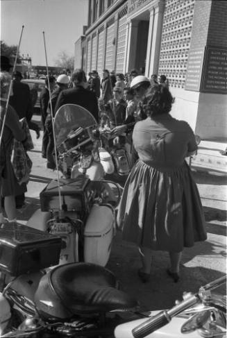 Image of a crowd outside the Texas School Book Depository
