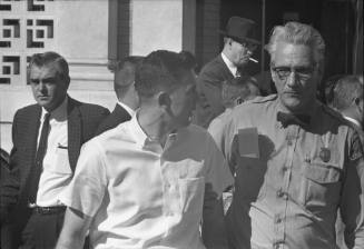 Image of unidentified witness in front of the Texas School Book Depository