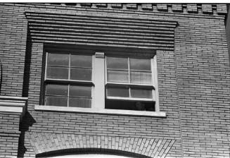 Image of the sniper's perch window at the Texas School Book Depository