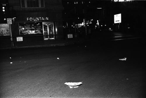 Image of Commerce Street in downtown Dallas the evening of November 22, 1963