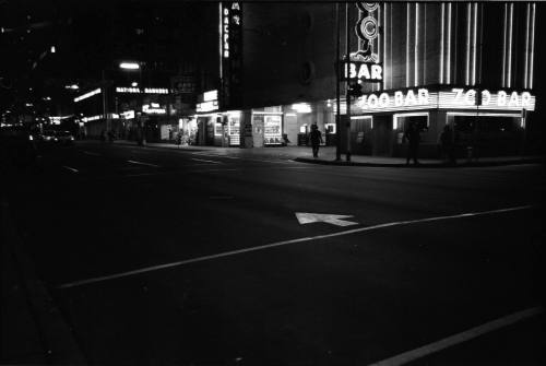 Image of Commerce Street in downtown Dallas the evening of November 22, 1963