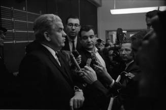 Image of D.A. Henry Wade's press conference at the Dallas Police Department