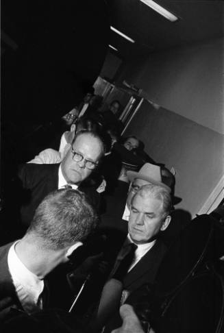 Image of Jesse Curry, Henry Wade and Will Fritz in the hallway