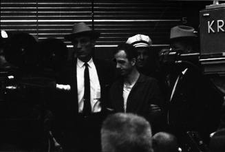 Image of Lee Harvey Oswald during the midnight press showing
