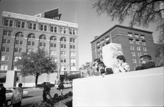 Image of people in Dealey Plaza the day after the assassination