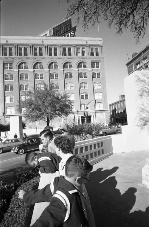 Image of people in Dealey Plaza the day after the assassination