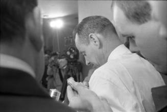 Image of Dallas Police Detective Paul Bentley speaking with reporters