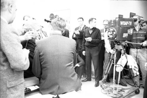 Image of Dallas County Criminal District Attorney Henry Wade with reporters