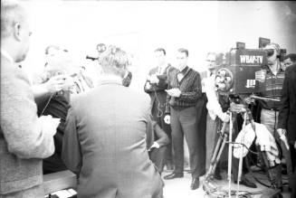 Image of Dallas County Criminal District Attorney Henry Wade with reporters