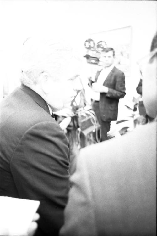 Image of Dallas County Criminal District Attorney Henry Wade with reporters