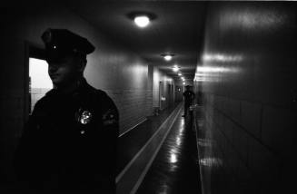 Image of Dallas Police officers in a hallway at Parkland Hospital