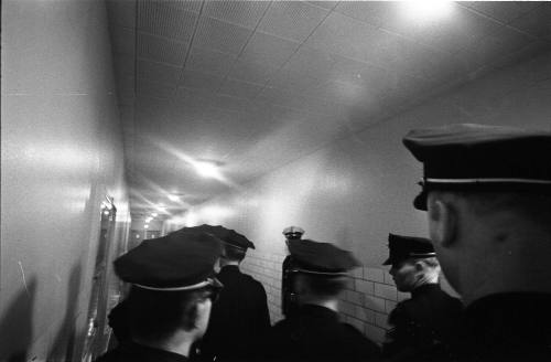 Image of Dallas Police officers in a hallway at Parkland Hospital