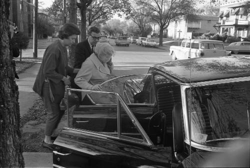 Image of Jack Ruby's sister Eva Grant leaving for the Dallas Police Department