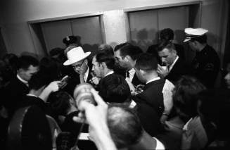Image of Tom Howard speaking to reporters at the Dallas Police Department