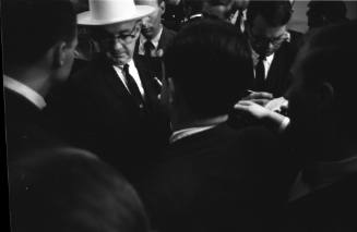 Image of Tom Howard speaking to reporters at the Dallas Police Department