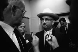 Image of Tom Howard speaking to reporters at the Dallas Police Department