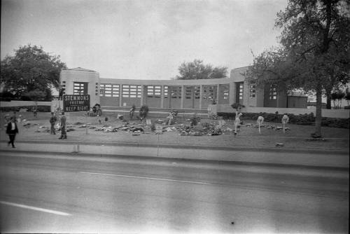 Image of memorial flowers in Dealey Plaza on November 27, 1963