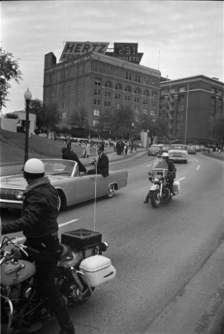 Image of the Secret Service reenactment of the assassination in Dealey Plaza