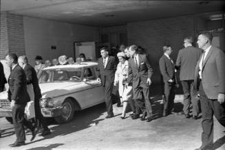 Image of Lady Bird Johnson leaving Parkland Hospital