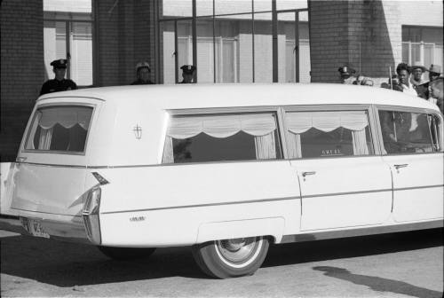 Image of hearse arriving at Parkland Hospital with casket for President Kennedy