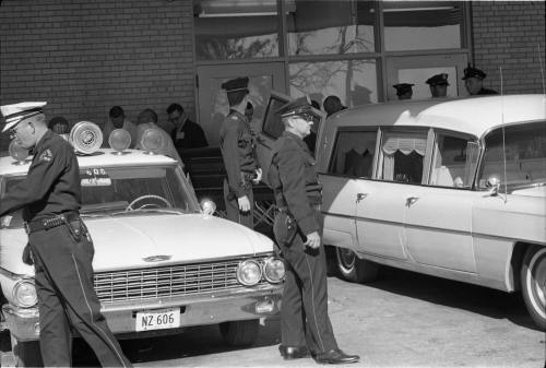 Image of casket being delivered to Parkland Hospital