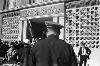 Image of Dallas Police officers outside the Texas School Book Depository