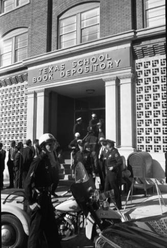 Image of Dallas Police officers outside the Texas School Book Depository