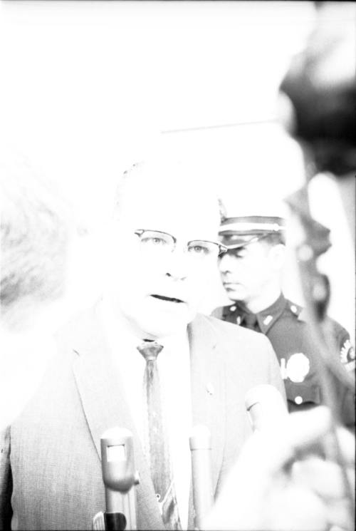 Image of Dallas Police Chief Jesse Curry speaking to reporters