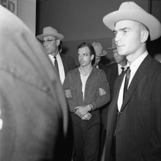 Image of Lee Harvey Oswald at Dallas Police headquarters on November 22, 1963