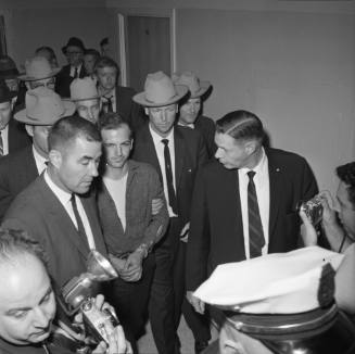 Image of Lee Harvey Oswald at Dallas Police headquarters on November 22, 1963