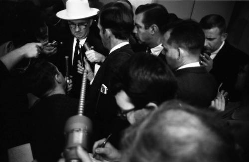 Image of Tom Howard speaking to reporters at the Dallas Police Department