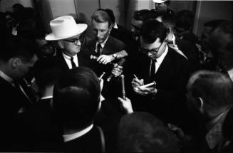 Image of Tom Howard speaking to reporters at the Dallas Police Department
