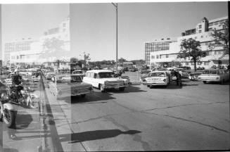 Image of hearse leaving Parkland Hospital en route to Love Field