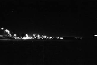 Image of the Dallas skyline on the night of November 22, 1963