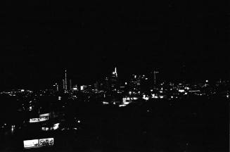 Image of the Dallas skyline on the night of November 22, 1963