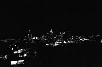 Image of the Dallas skyline on the night of November 22, 1963