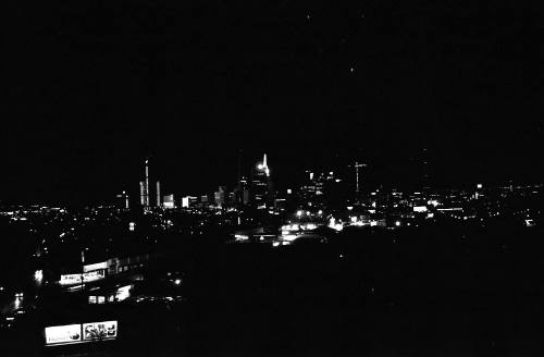 Image of the Dallas skyline on the night of November 22, 1963