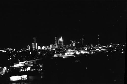 Image of the Dallas skyline on the night of November 22, 1963