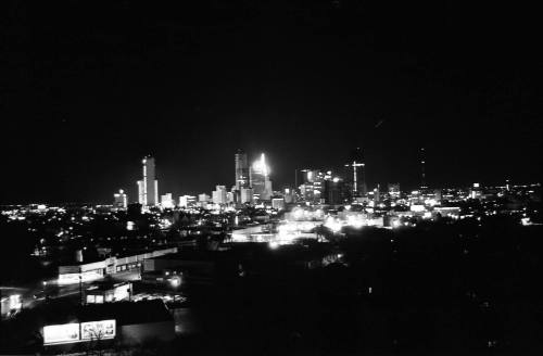 Image of the Dallas skyline on the night of November 22, 1963