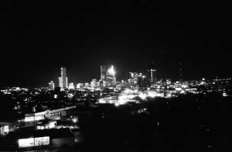 Image of the Dallas skyline on the night of November 22, 1963
